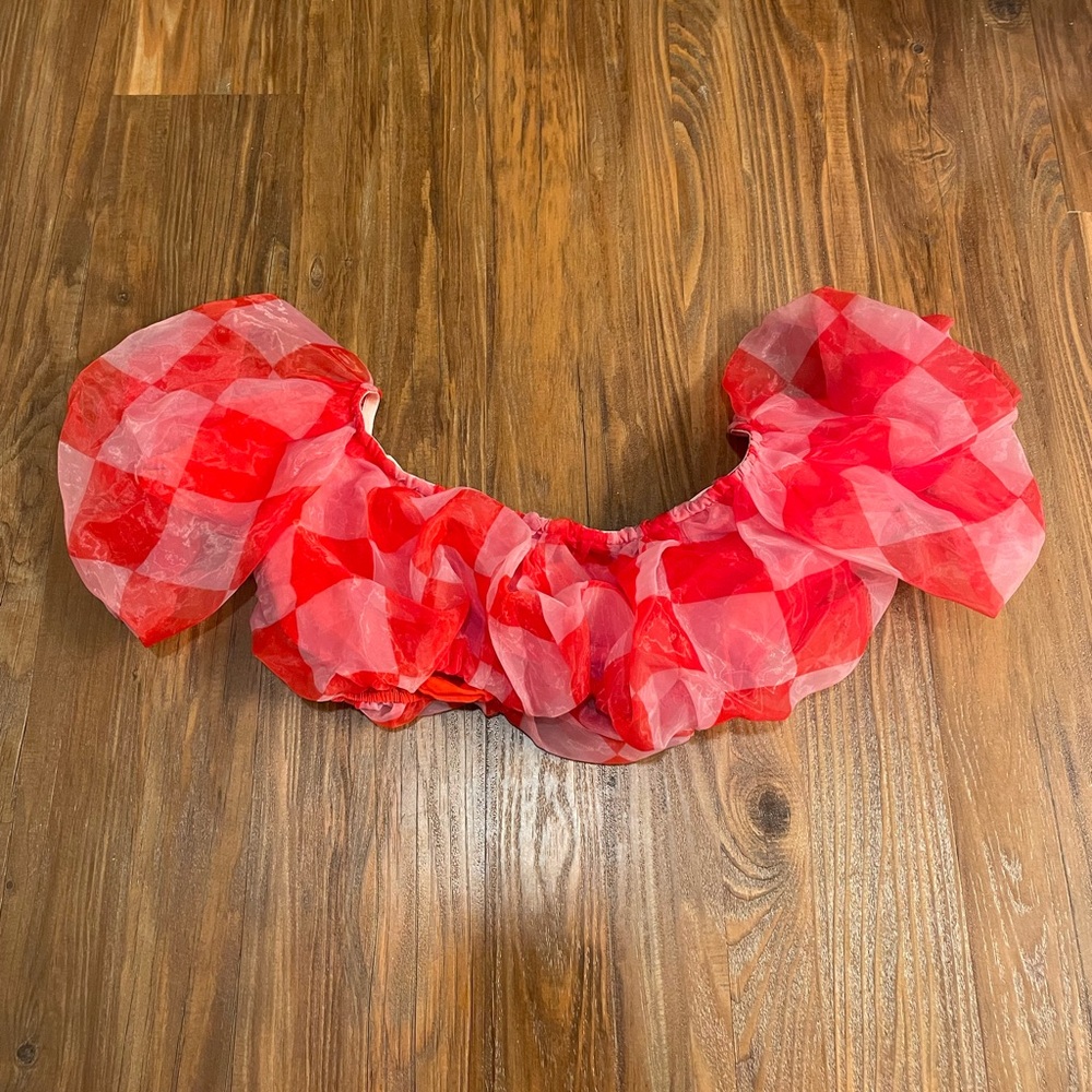 Tube top, lots of frills. Red and pink checkered. Size S